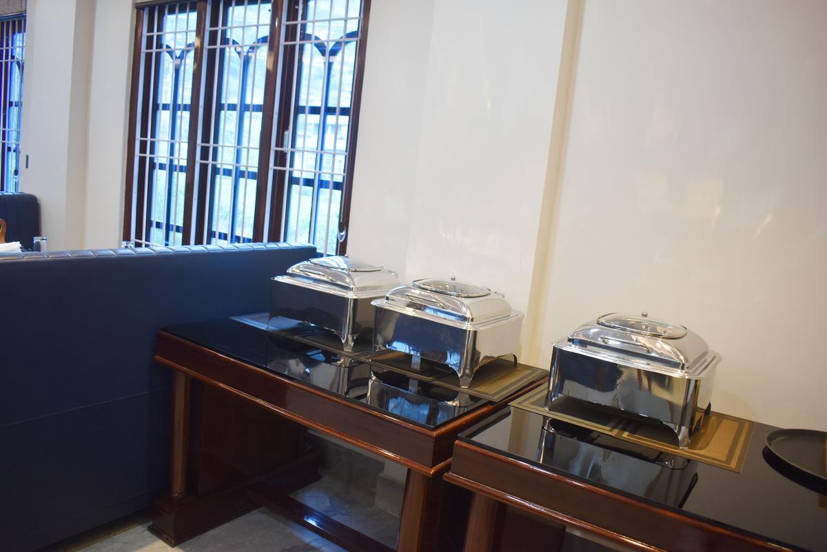 Buffet counter with chafing dishes at Hotel Pema Lhatse restaurant